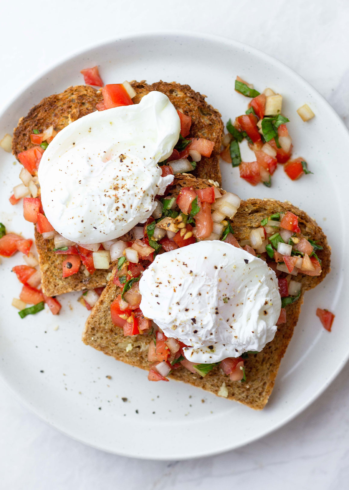Bruschetta topped Garlic Toast with Poached Eggs | FavFlave